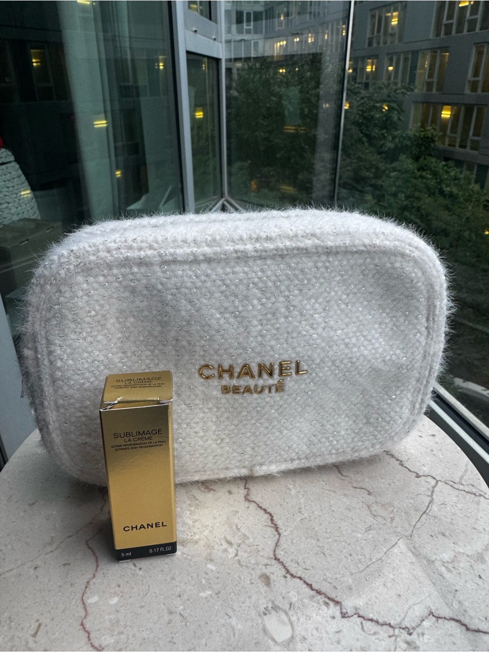 CHANEL White Textured Cosmetic Pouch with Gold Logo